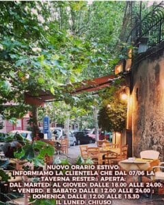 Outdoor seating area at Magn' A Grecia Greek restaurant in Naples