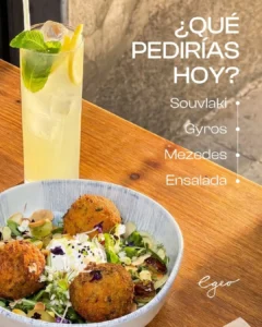 Greek-style salad with fried bites and a citrus drink served at Egeo