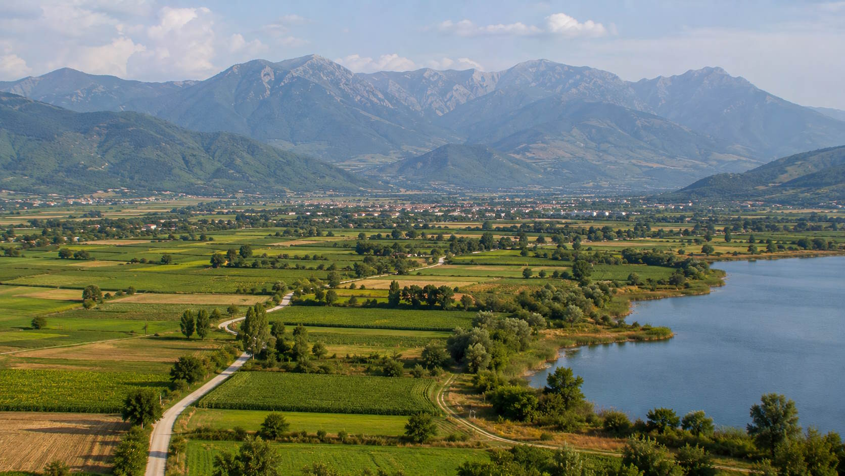 Fertile plain, lake and mountain landscape in Karditsa, Greece