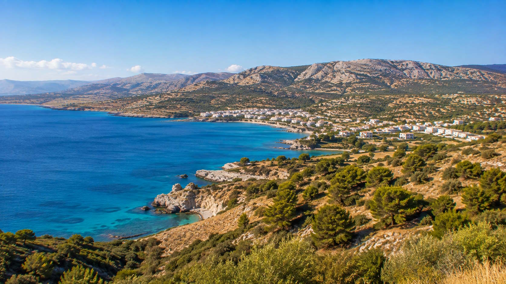 Turquoise Aegean coastline and mountainous landscape of Rhodes, Greece
