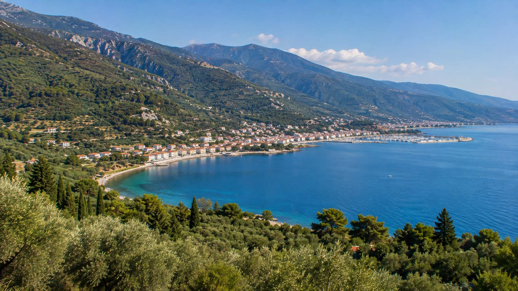 Mountainous coastline and seaside settlement on Samos island, Greece