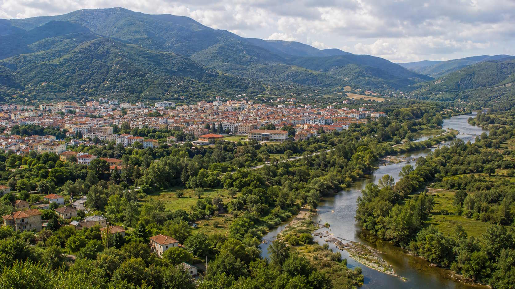Xanthi town beside a river and forested mountains in Thrace, Greece