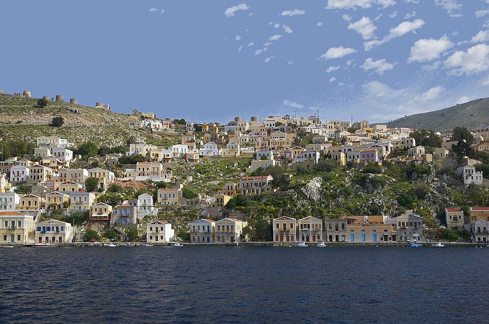 Traditional colorful houses along the waterfront of Symi in the Dodecanese, Greece