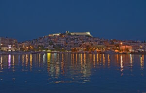 Night view of Kavala waterfront and historic old town in Macedonia, Greece